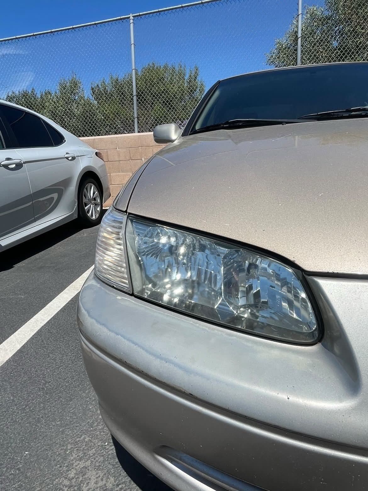 Restored, clear headlight lens after treatment