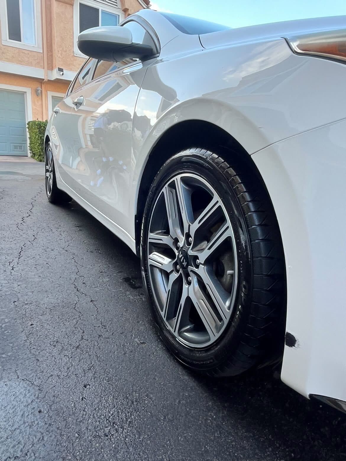 Cleaned wheel and tire after an exterior detail